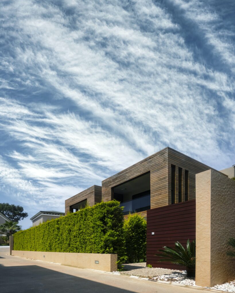 Modern houses with green plant wall
